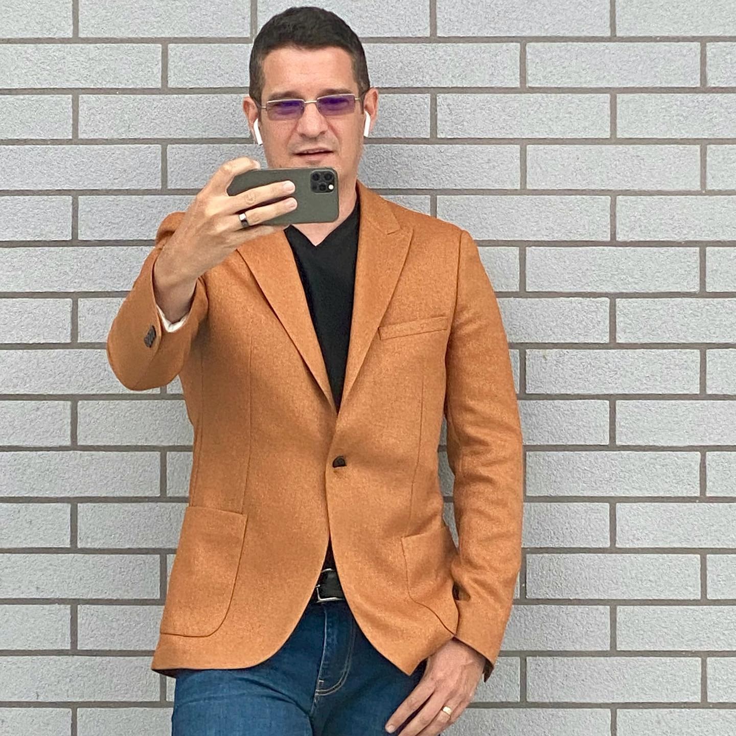 Sebastian Cochinescu photographed before a live Digi24 phone interview about crypto